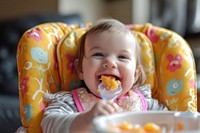 Cute toddler girl baby eating food.