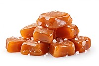 Melted caramel candies with sea salt on top dessert food white background.