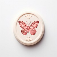 Seal Wax Stamp a butterfly shape white background confectionery.