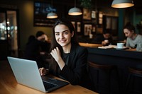 Portrait of a happy young businesswoman laptop coffee computer. AI generated Image by rawpixel.