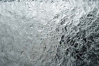 Frosted glass surface backgrounds ice condensation.