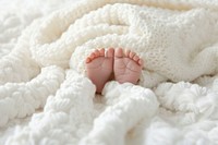 Newborn baby feet blanket white comfortable.