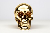 Skull gold white background jewelry.