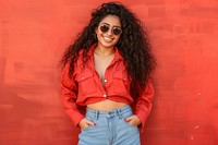 Cool chubby young black woman with fashionable clothing style full body on colored background smile individuality architecture.