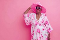 Cool senior black woman with fashionable clothing style portrait on colored background glasses adult fun.