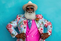 Cool senior black man with fashionable clothing style portrait on colored background adult male individuality.