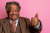 Cool senior black man with fashionable clothing style portrait on colored background adult hand male.