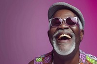Cool senior black man with fashionable clothing style portrait on colored background laughing glasses adult.