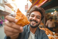 Indian businessman eating food smiling smile.