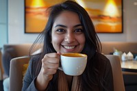 Indian businesswoman drinking portrait smiling coffee.