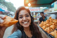 Indian businesswoman eating food smiling adult.