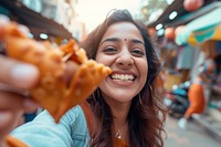 Indian businesswoman eating food smiling adult.