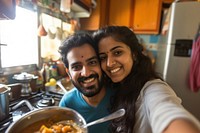 Indian couple cooking selfie food portrait.
