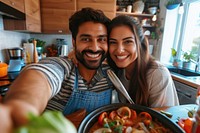 Indian couple cooking selfie food portrait.