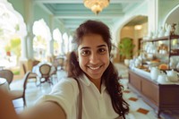 Indian hotel waitress serving selfie smiling smile.