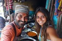 Adult Indian traveller portrait smiling selfie.