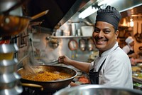 Indian chef cooking food smiling adult.