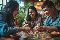 Chinese playing board game with friends adult togetherness opportunity.