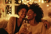 African American lesbian couple photography champagne laughing.