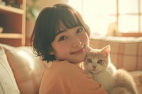 Japanese female kitten portrait smiling.