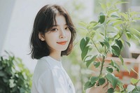 Korean female smiling plant hair.