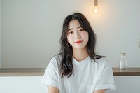 Korean female smiling white contemplation.