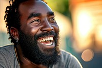 Black people delighted laughing portrait beard.