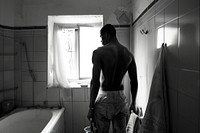 Black South African man bathroom bathtub black.