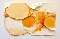 Abstract pancake with honey ripped paper art cracked pattern.