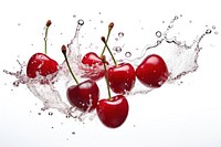 Cherry floating with splash falling fruit plant.