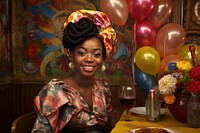 African woman on a birthday portrait adult table. 