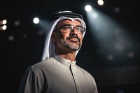 Arab business man portrait glasses standing.