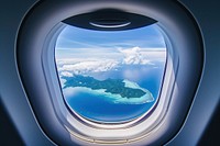 Large window see tropical islands airplane porthole nature.