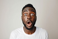 Afican American man surprised face portrait adult frustration.