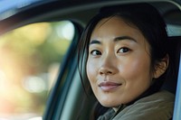 Asian woman driving a car happy vehicle window adult.