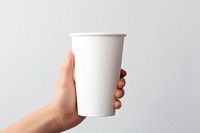 Plastic cup  hand holding coffee.
