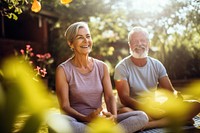 Senior couple smiling while practicing yoga together in a serene garden adult day togetherness. 