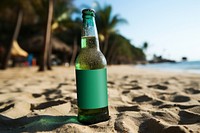Beer bottle on a beach