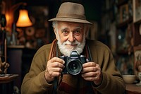 Elder man taking a photo with dslr camera photographer portrait adult. AI generated Image by rawpixel.