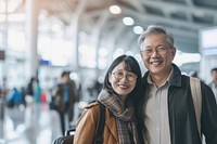 Asian couple at the airport adult togetherness architecture.