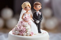 Wedding cake bride figurine dessert.