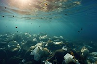 Trash in the sea underwater outdoors nature. AI generated Image by rawpixel.