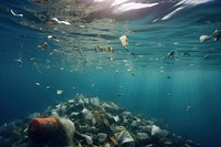 Trash in the sea underwater pollution swimming. 