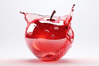 Apple melting down glass refreshment splattered.