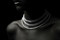 Pearl chocker on neck necklace jewelry black.