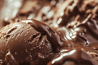 Chocolate syrup dripping on chocolate ice cream dessert food backgrounds.