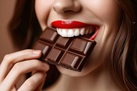 Woman biting chocolate bar adult food red.