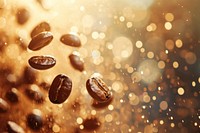 Coffee beans shape pattern bokeh effect background coffee backgrounds gold.