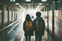 Japanese couple walking corridor backpack. AI generated Image by rawpixel.