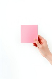 Pink pastel Sticky note  holding paper hand.